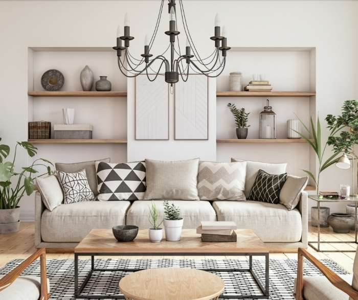 living room with white sofa and black chandelier