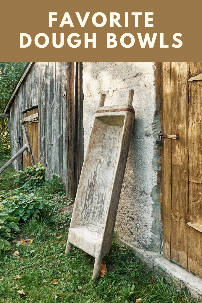 XL Wooden Dough Board leaning against an old wooden house