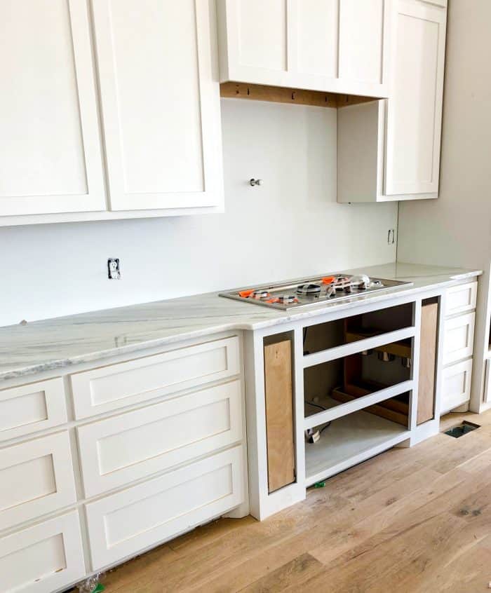 kitchen with new white and gray countertops