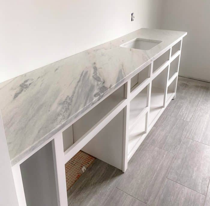 bathroom vanity with quartzite countertop