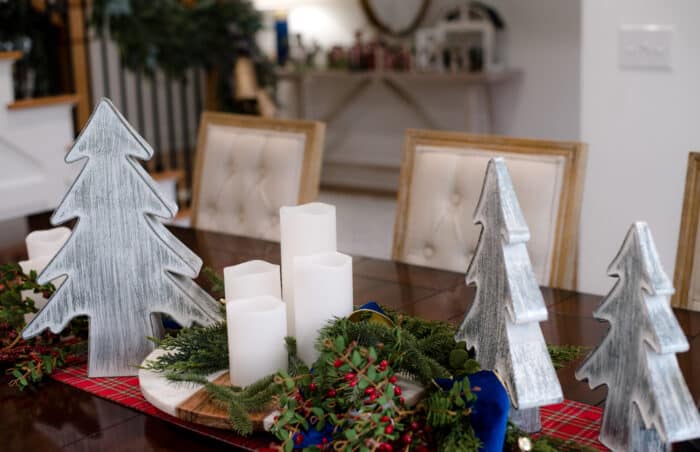 Dining Room table decor - greenery, candles and trees