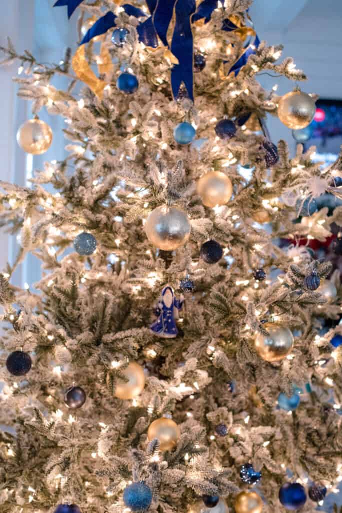 Aspen Pine Christmas tree decorated in navy and gold