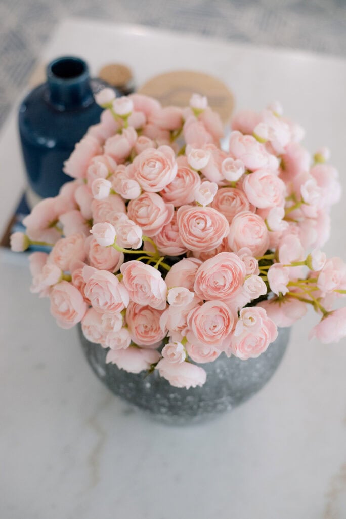 pink flowers on coffee table