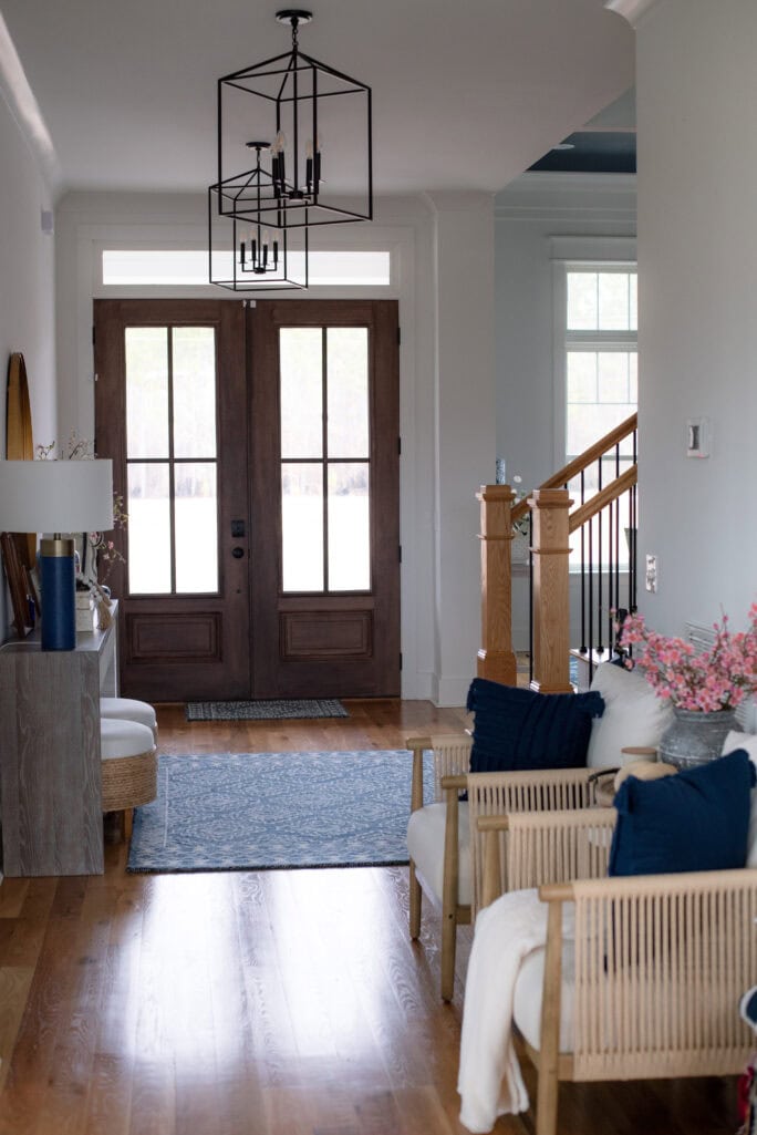 modern farmhouse entryway with double doors and console table