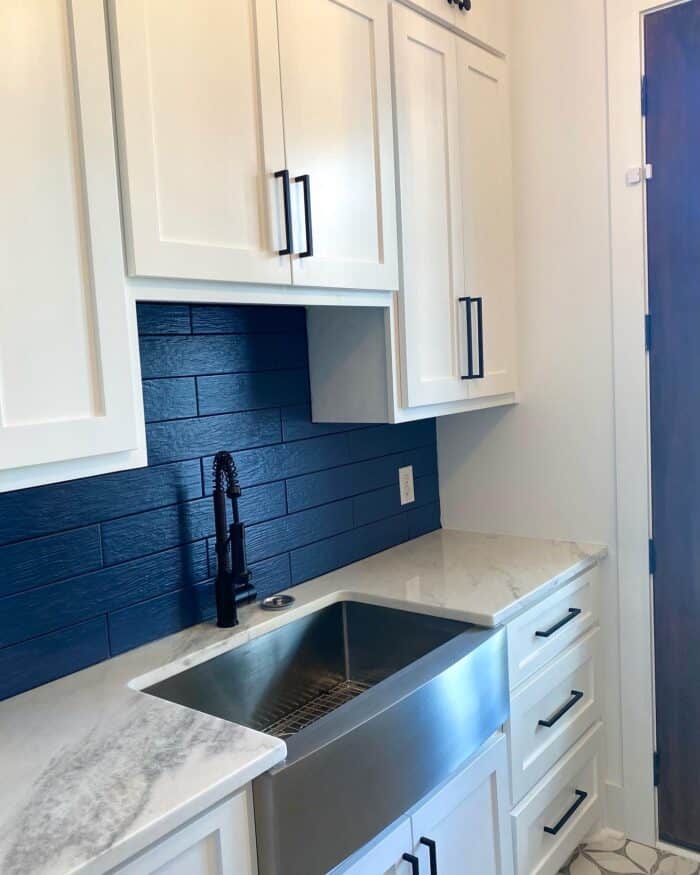 blue backsplash in laundry room